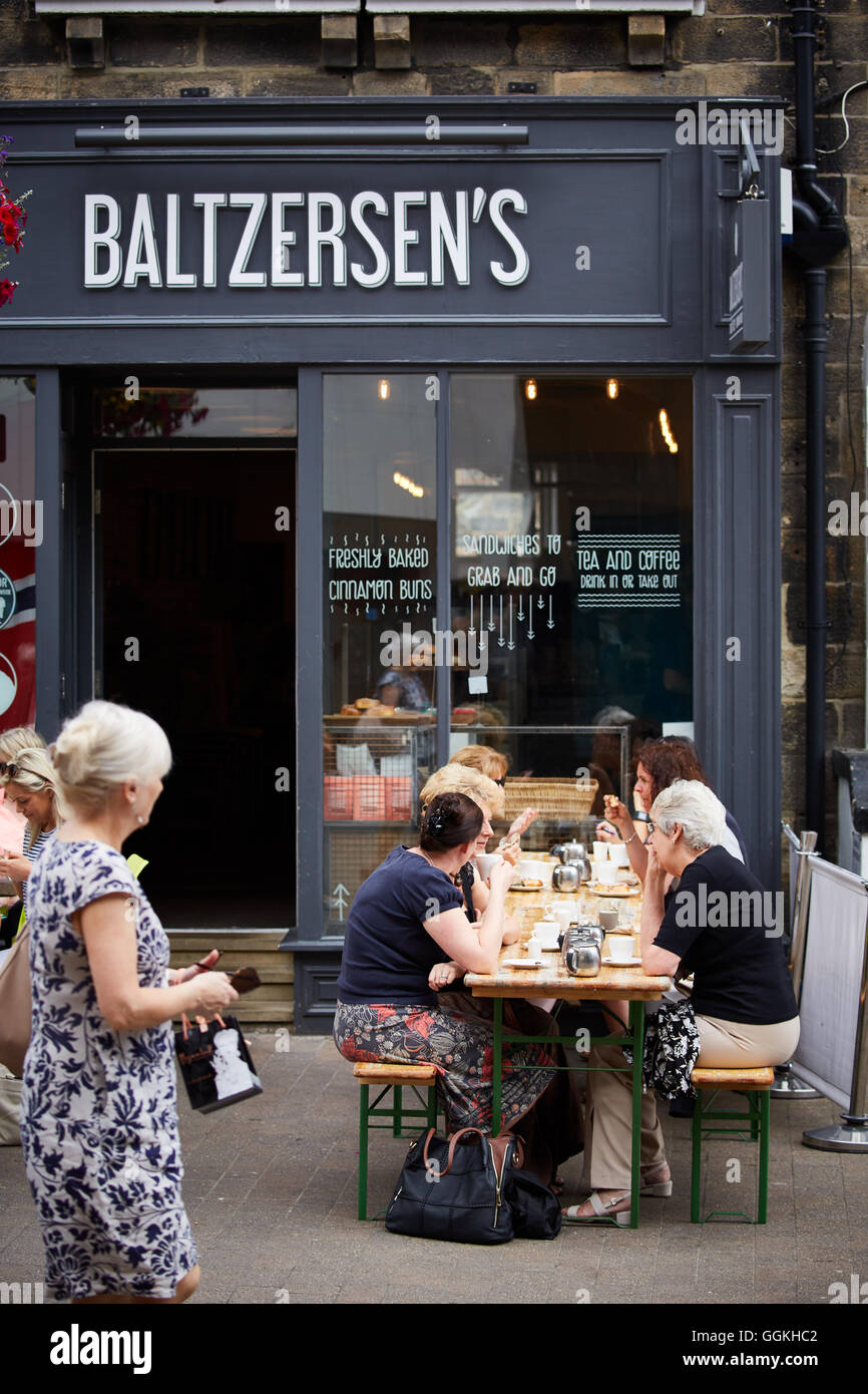 Harrogate restaurant cafe Baltzern's  Al fresco dining eating outside bench street sitting relaxed relaxing pavement cafe cultur Stock Photo