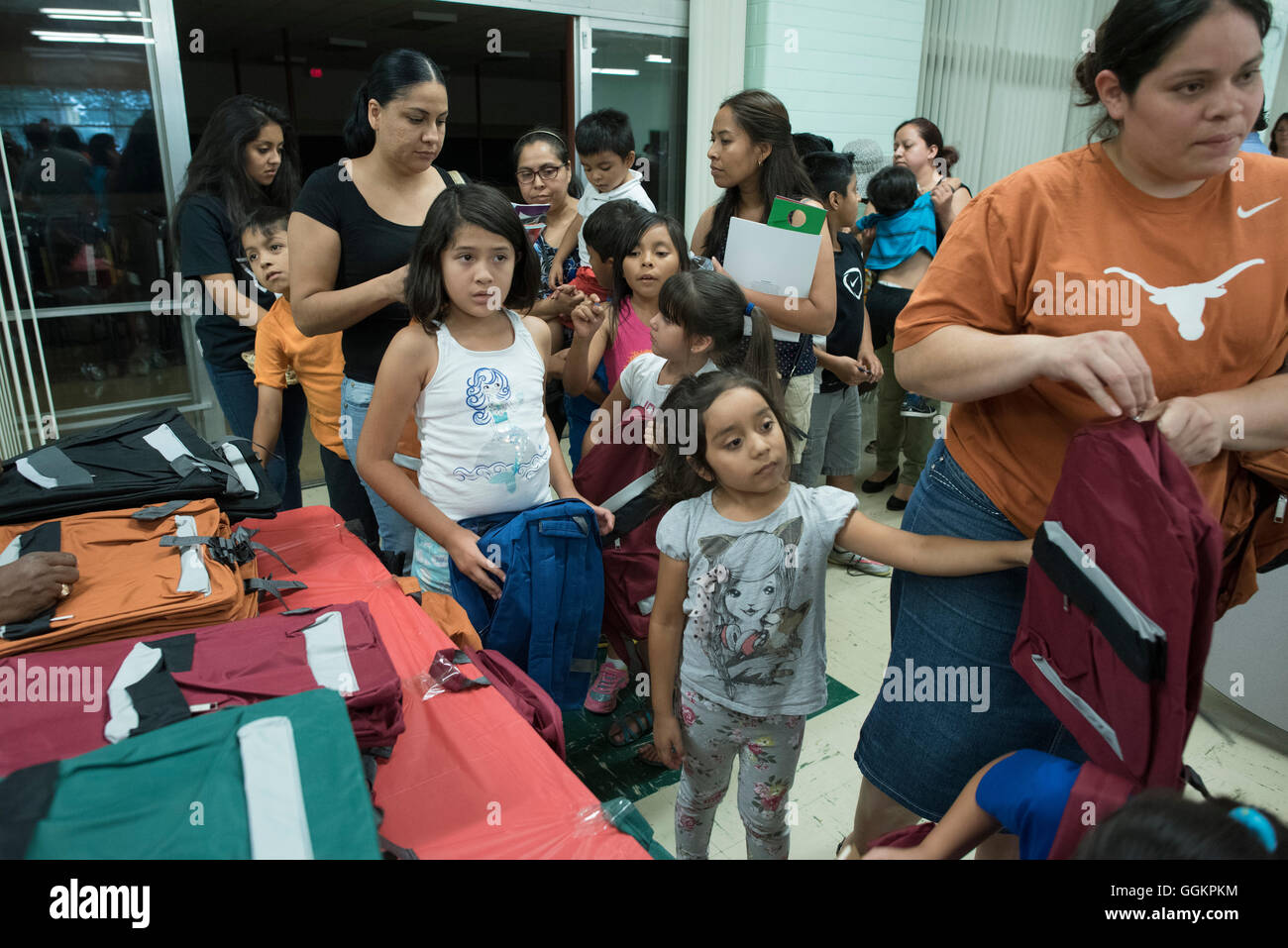 Kids and parents get  free school supplies and backpacks at Colorin Colorado summer program for English language learners Stock Photo