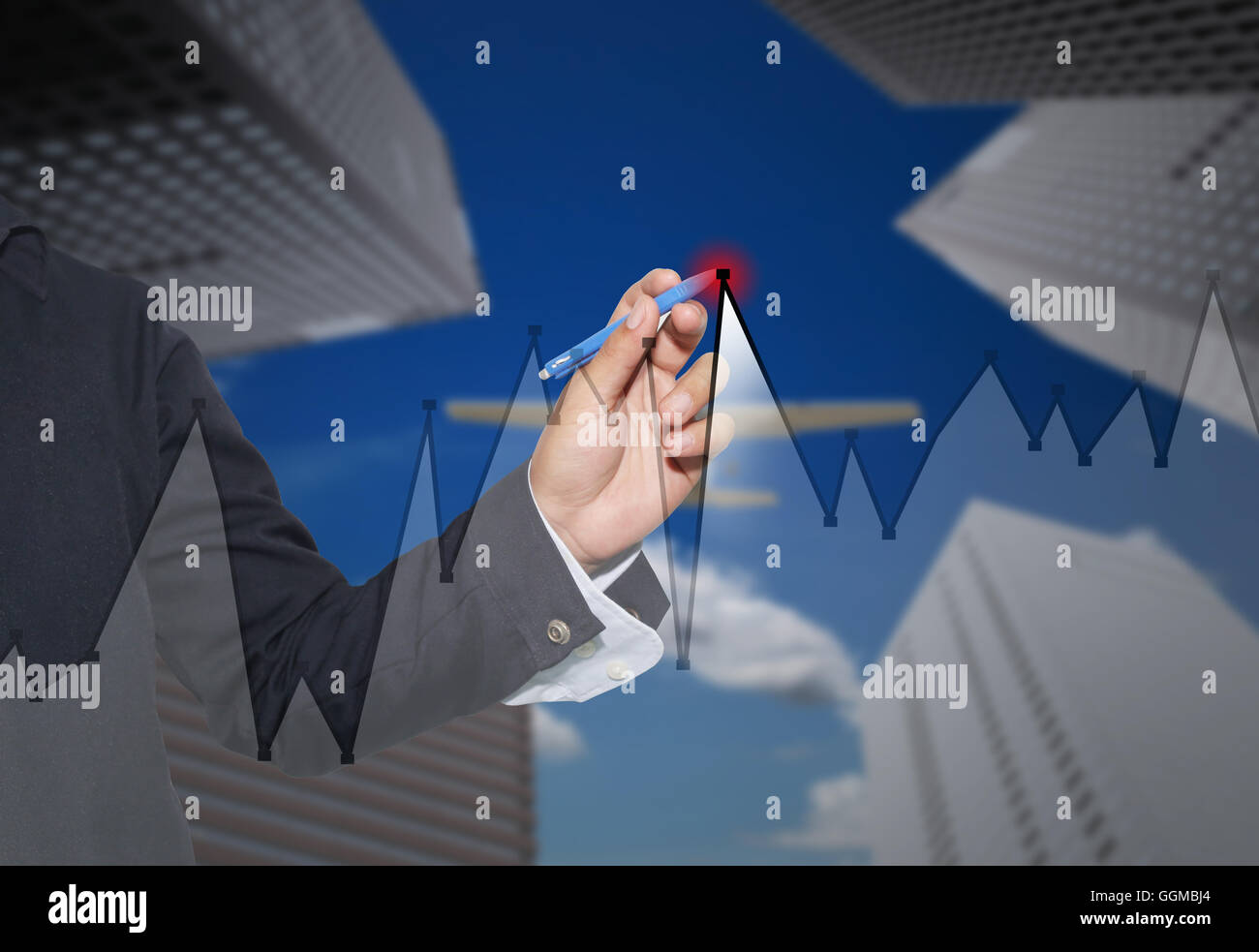 Hand of businessman drawing graphics a top point growing graph to ...