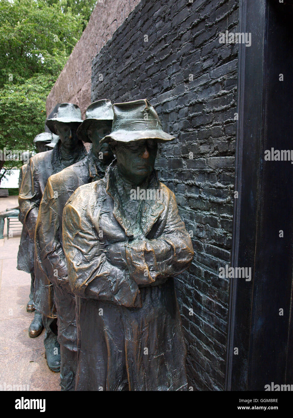 statues of unemployed men standing in a bread line during the Great Depression at the FDR Memorial in Washington, D.C. Stock Photo