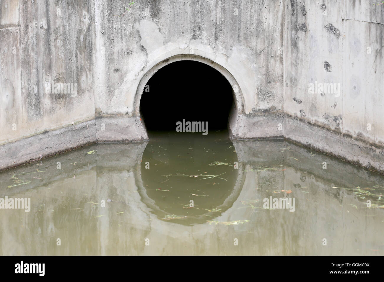 Water Drain,Drain flow into the canal for prevent flood events in the city. Stock Photo