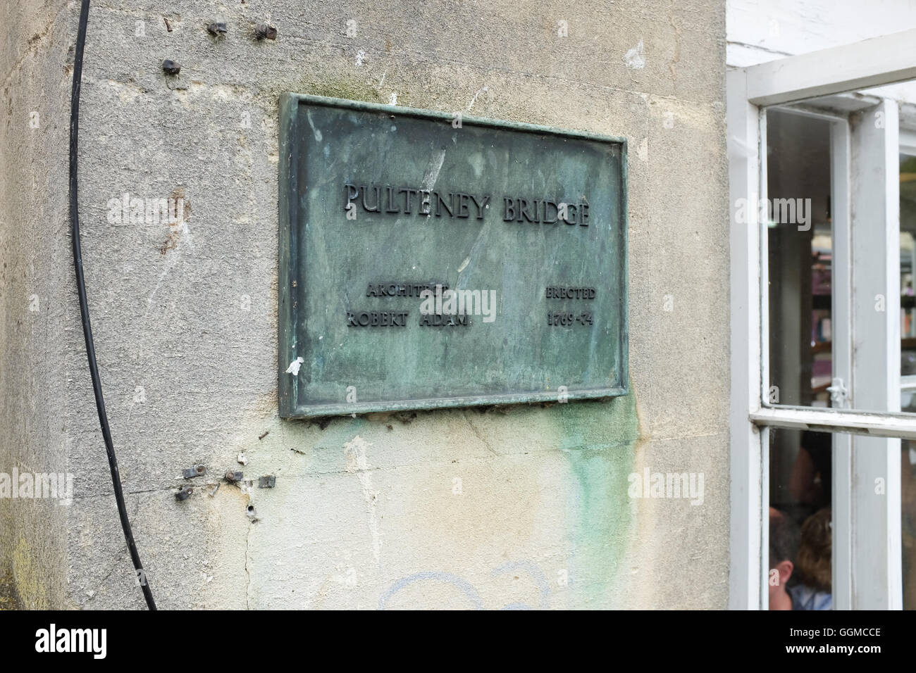 A sign on Pulteney Bridge in Bath, England. Stock Photo