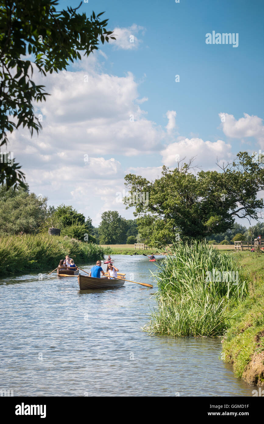 Boating along the river Stour near Dedham Stock Photo