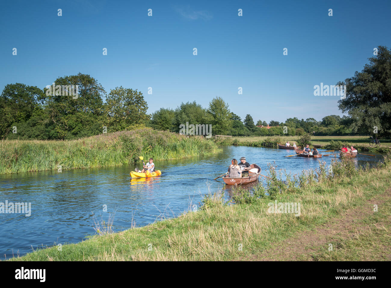 Boating along the River Stour near Dedham, Suffolk Stock Photo