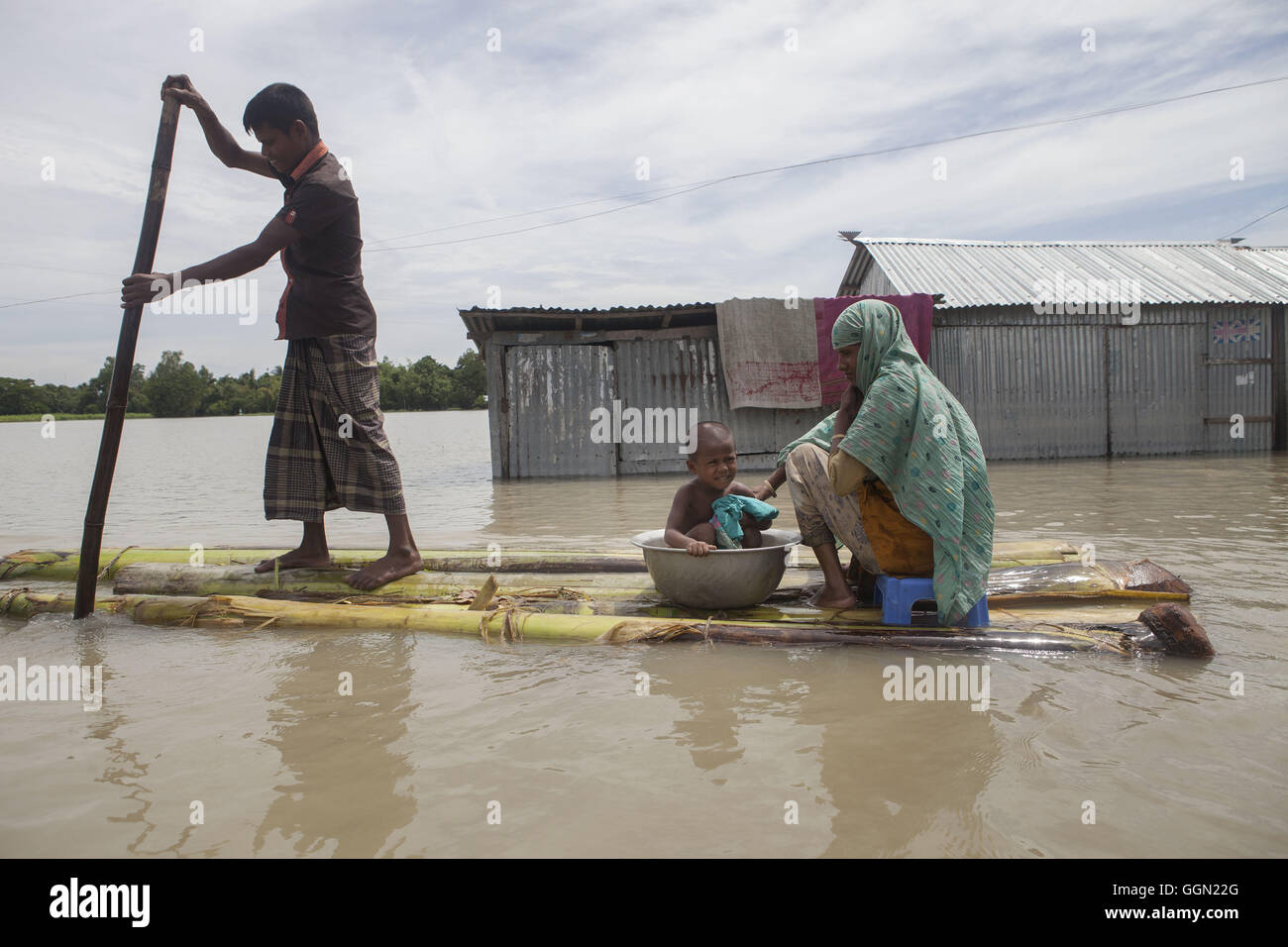 August 2, 2016 - Jamalpur, Mymensingh, Bangladesh - A Family On A Raft ...