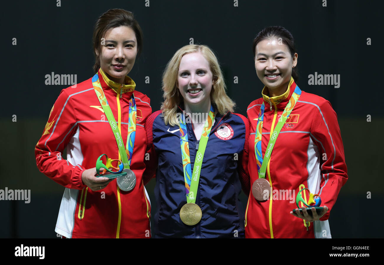 Rio de Janeiro, Brazil. 6th August, 2016. Deodoro, Rio de Janeiro, Brazil. 06th Aug, 2016. Gold medalist Virginia Thrasher from the USA is flanked by Silver medalist Li Du and Bronze medalist Siling Yi (r) both from China during the medal ceremony after the Olympic 10m Air Rifle 10m Women's finals in the Olympic Shooting Centre in Deodoro, Rio de Janeiro, Brazil, 06 August 2016. Photo: Friso Gentsch/dpa/Alamy Live News Credit:  dpa picture alliance/Alamy Live News Stock Photo