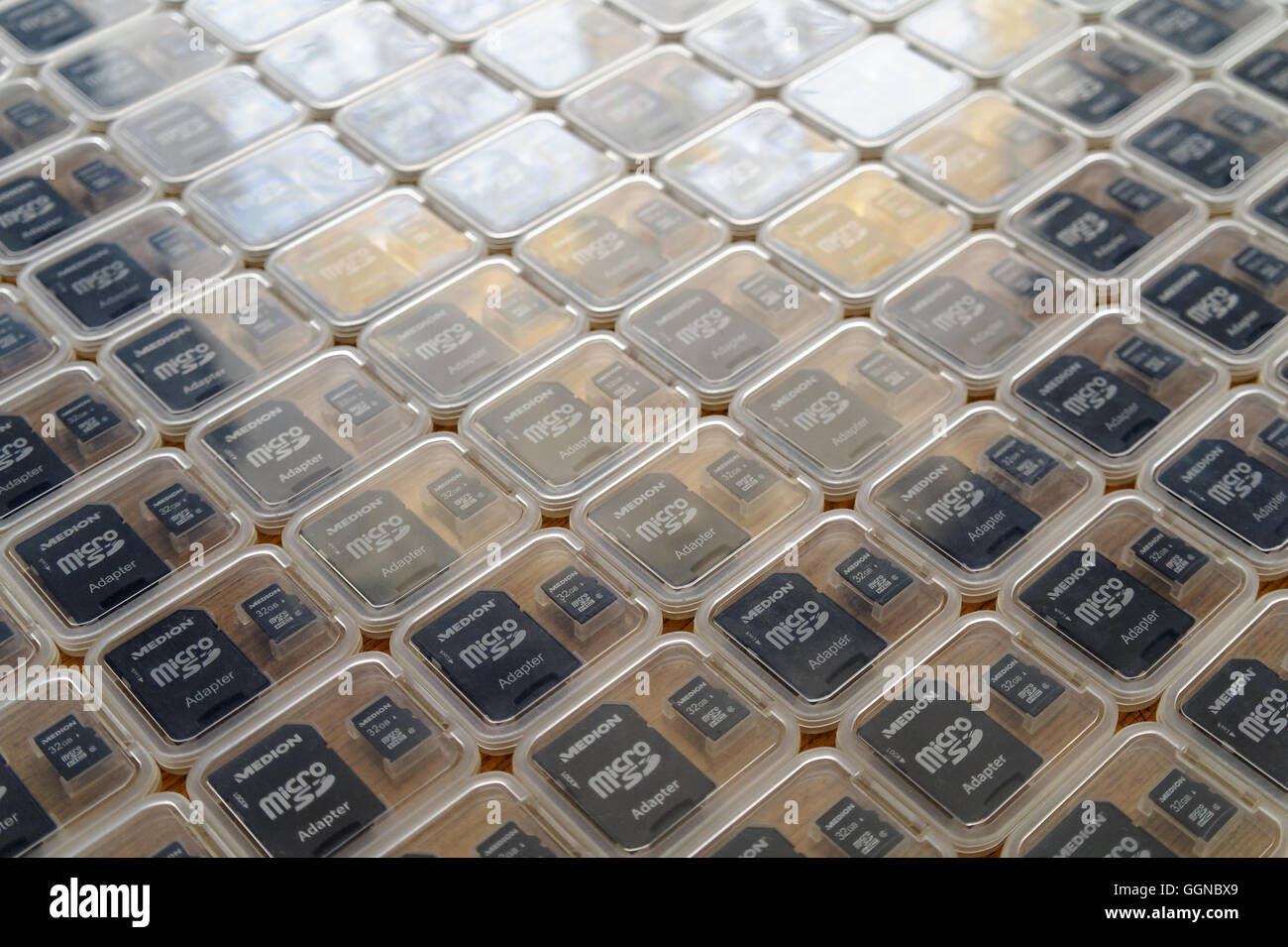micro SD memory cards and adapters in transparent boxes in perspective view Stock Photo