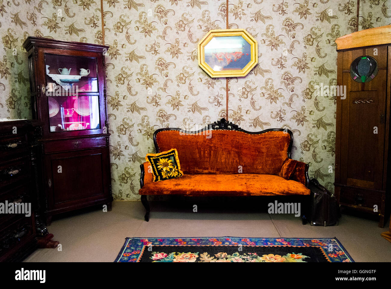 Retro livingroom furniture and wallpaper Stock Photo