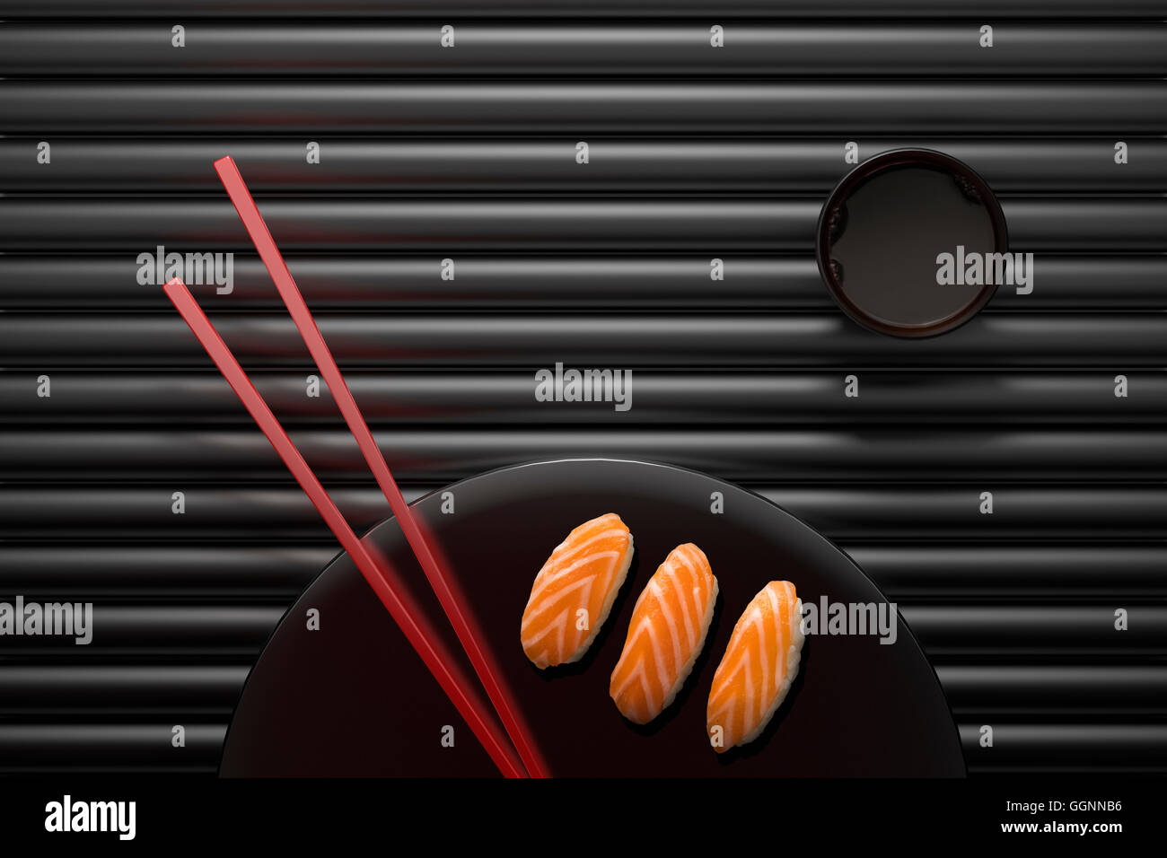 Chopsticks and sushi on round plate with dipping sauce Stock Photo