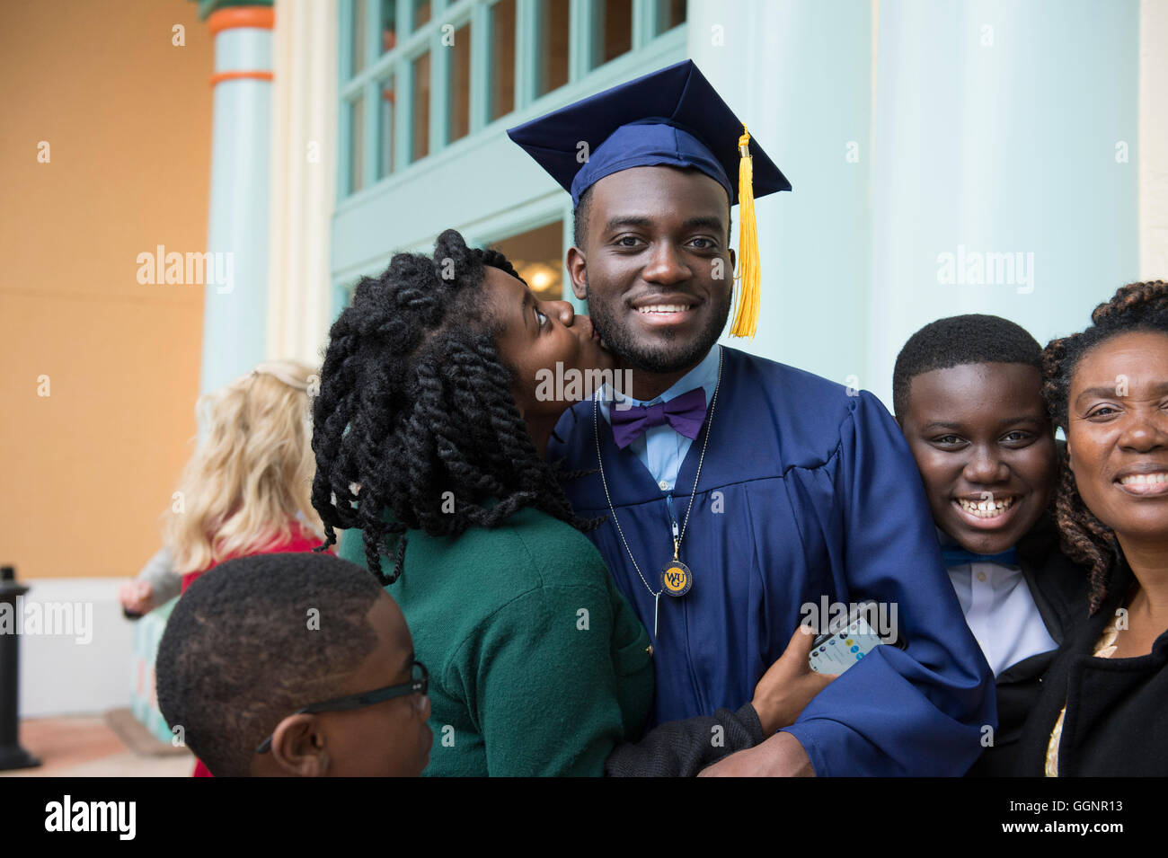 Family celebrates with graduate after commencement for Western