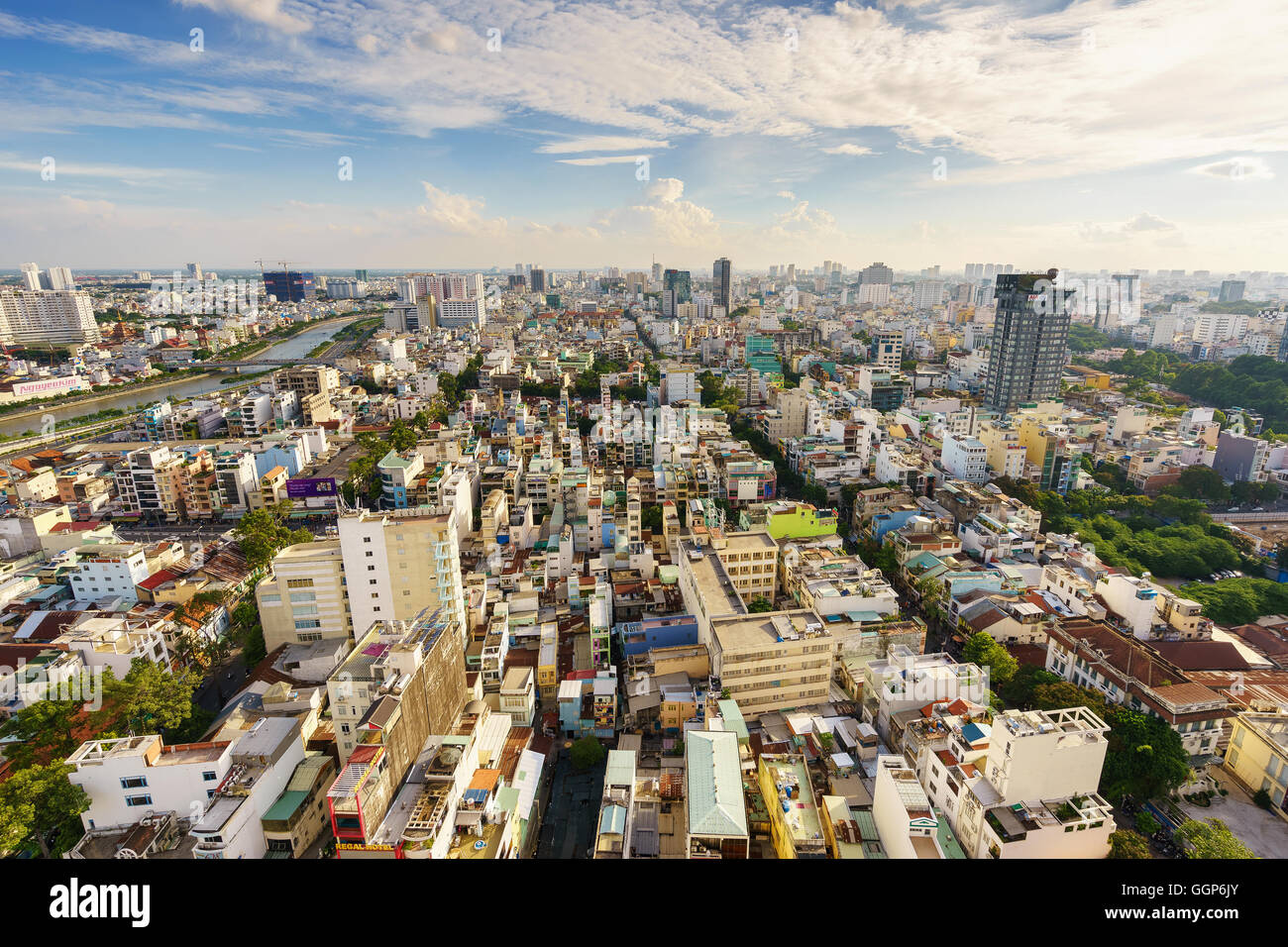 Ho Chi Minh city (or Saigon) skyline with colorful house in sunset