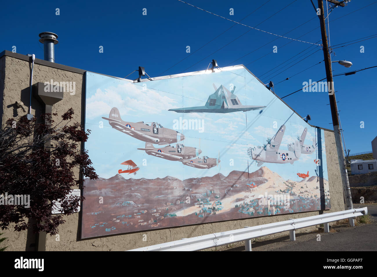 War plane mural on wall of building. Tonopah. Nevada. USA Stock Photo