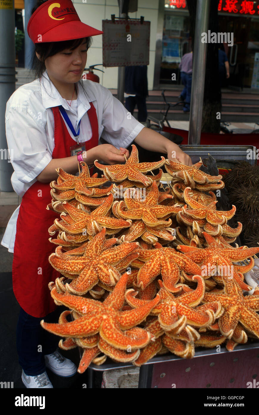 Starfish on the menu. Wangfujing Night Snack Street - Beijing,  China Stock Photo