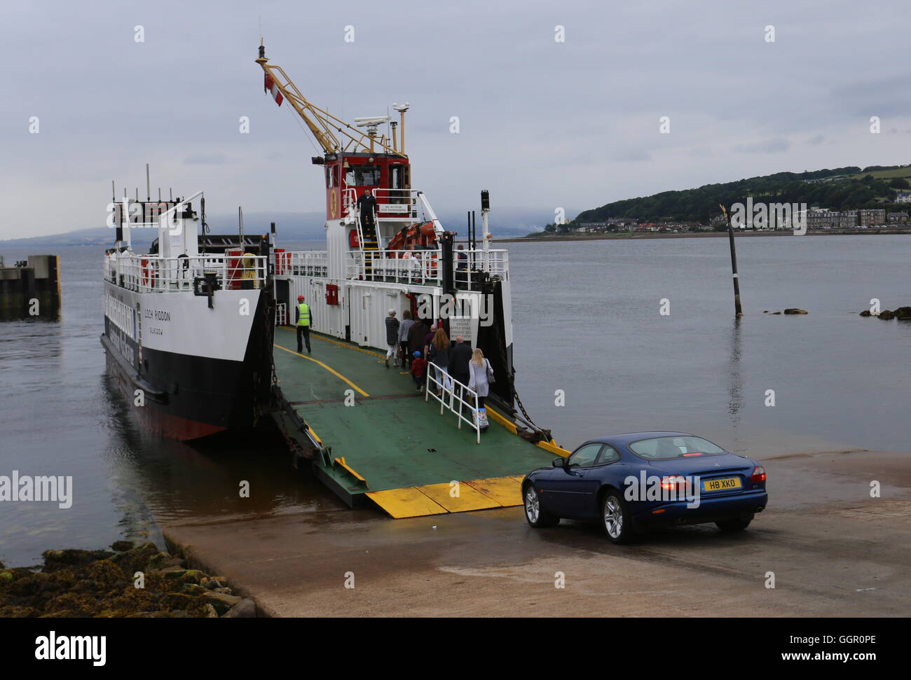 Passengers and car boarding Calmac ferry MV Loch Riddon Largs Scotland August 2016 Stock Photo