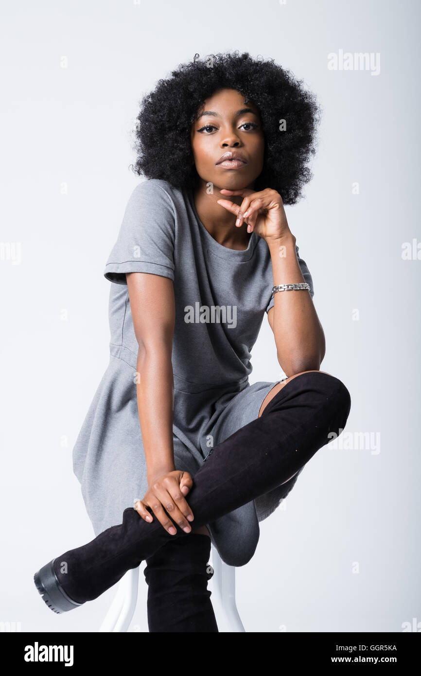 Afro Caribbean woman in her 20s shooting fashion images Stock Photo