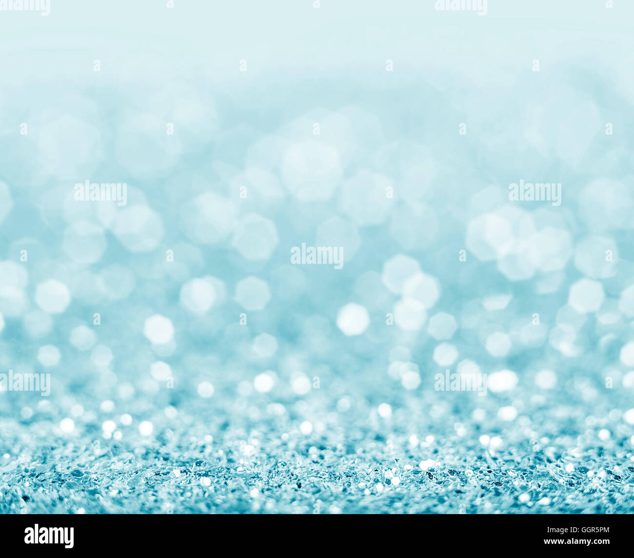 Abstract blue glitter background. Shiny glitter bokeh christmas background. Stock Photo