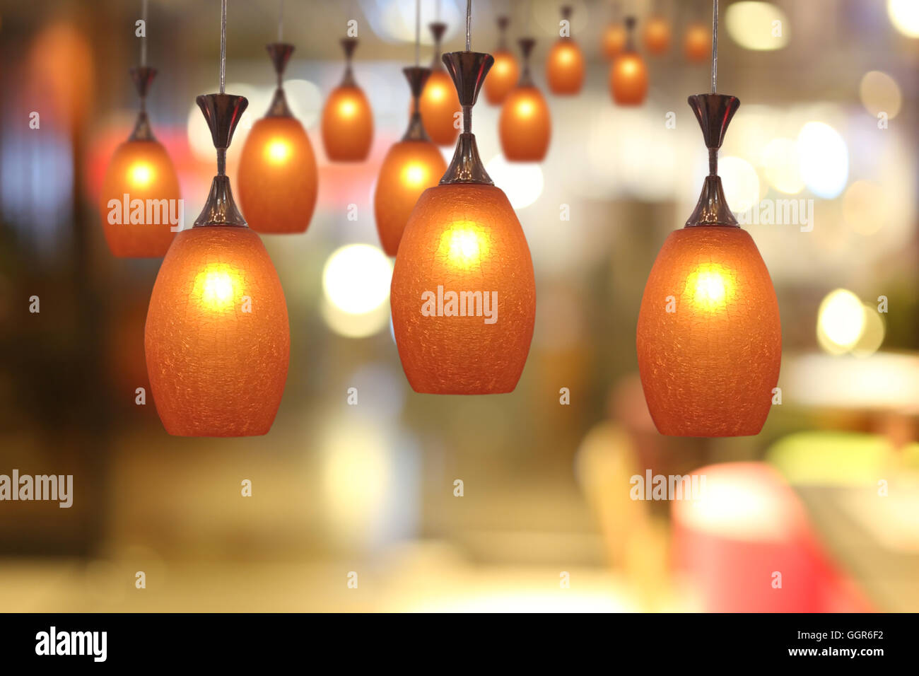 Warm lighting modern ceiling lamps in the cafe and interior decoration ...