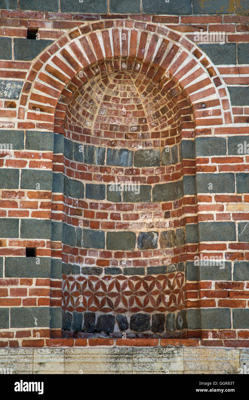 Closeup of the old stone church window Stock Photo