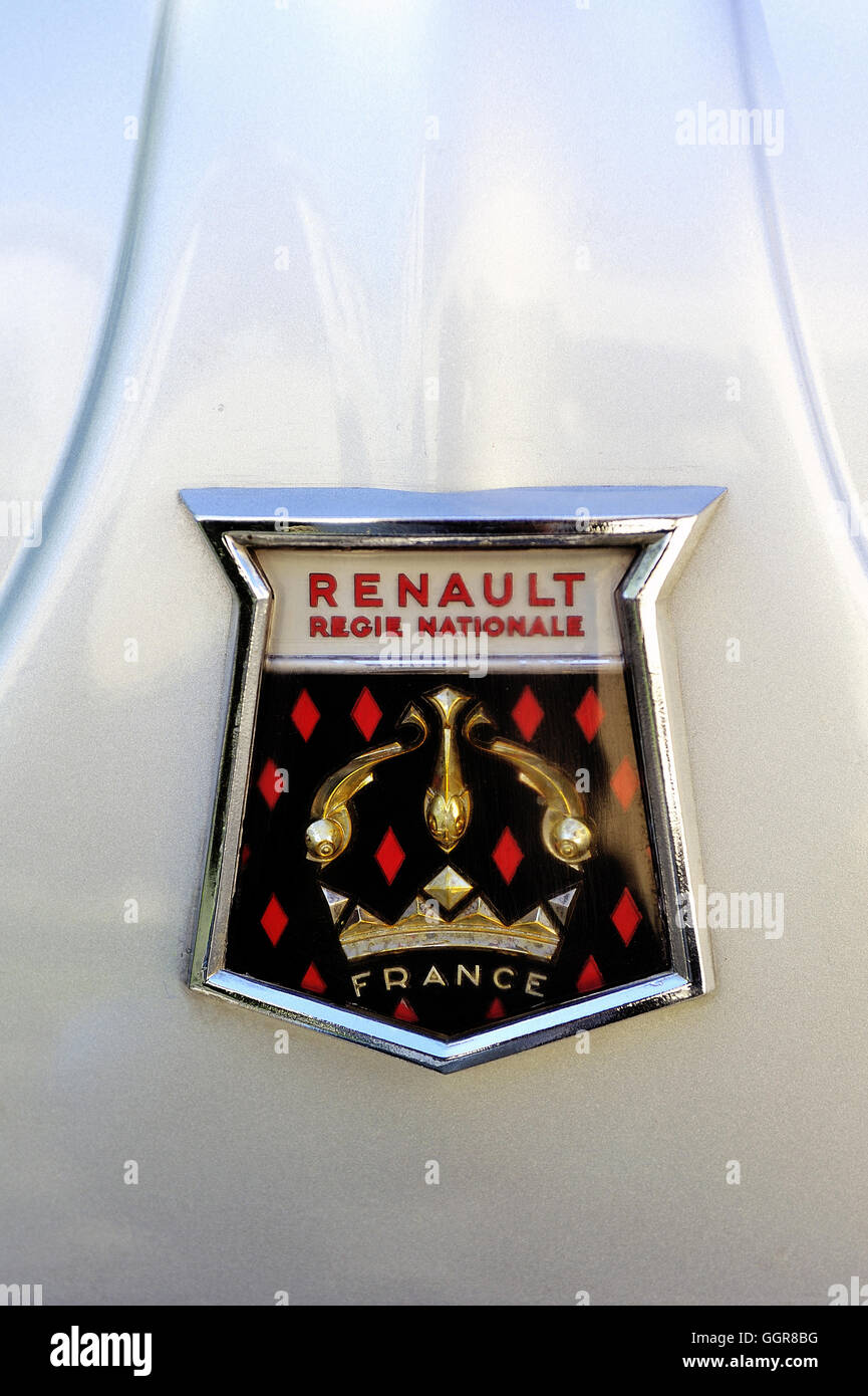 Logo Renault 1960 on the hood of a gray Dauphine Gordini photographed vintage car rally on City Hall Square in the city of Ales Stock Photo
