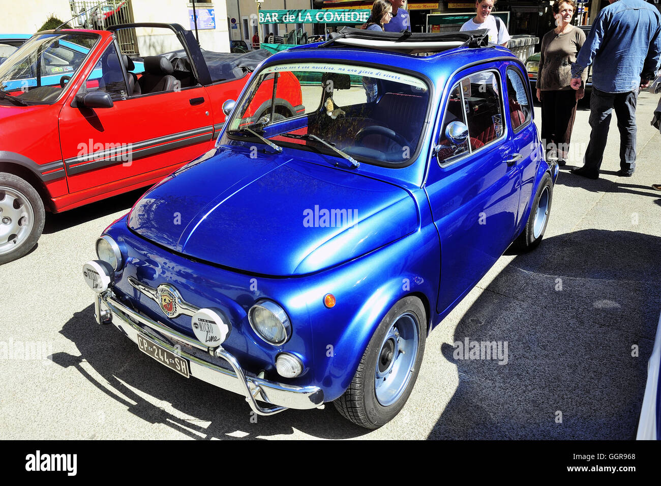Old Fiat 500 Abarth racing equipped photographed vintage car rally Town Hall Square in the town of Ales, in the Gard department Stock Photo