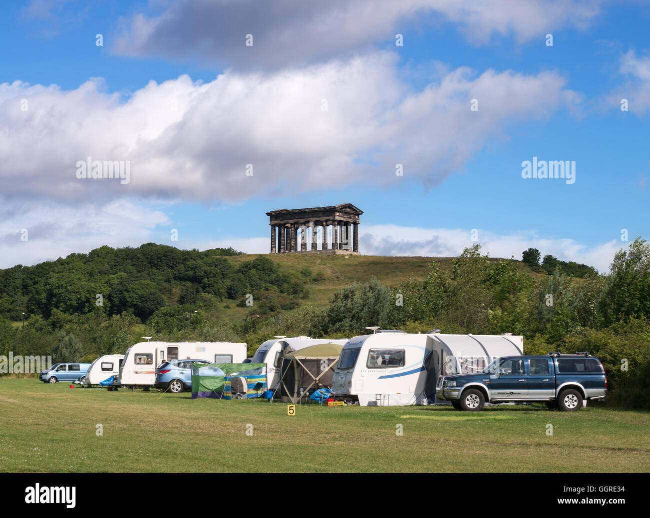 Touring caravans in Herrington Country Park, with Penshaw monument in the background,  Sunderland, Tyne and Wear, England Stock Photo