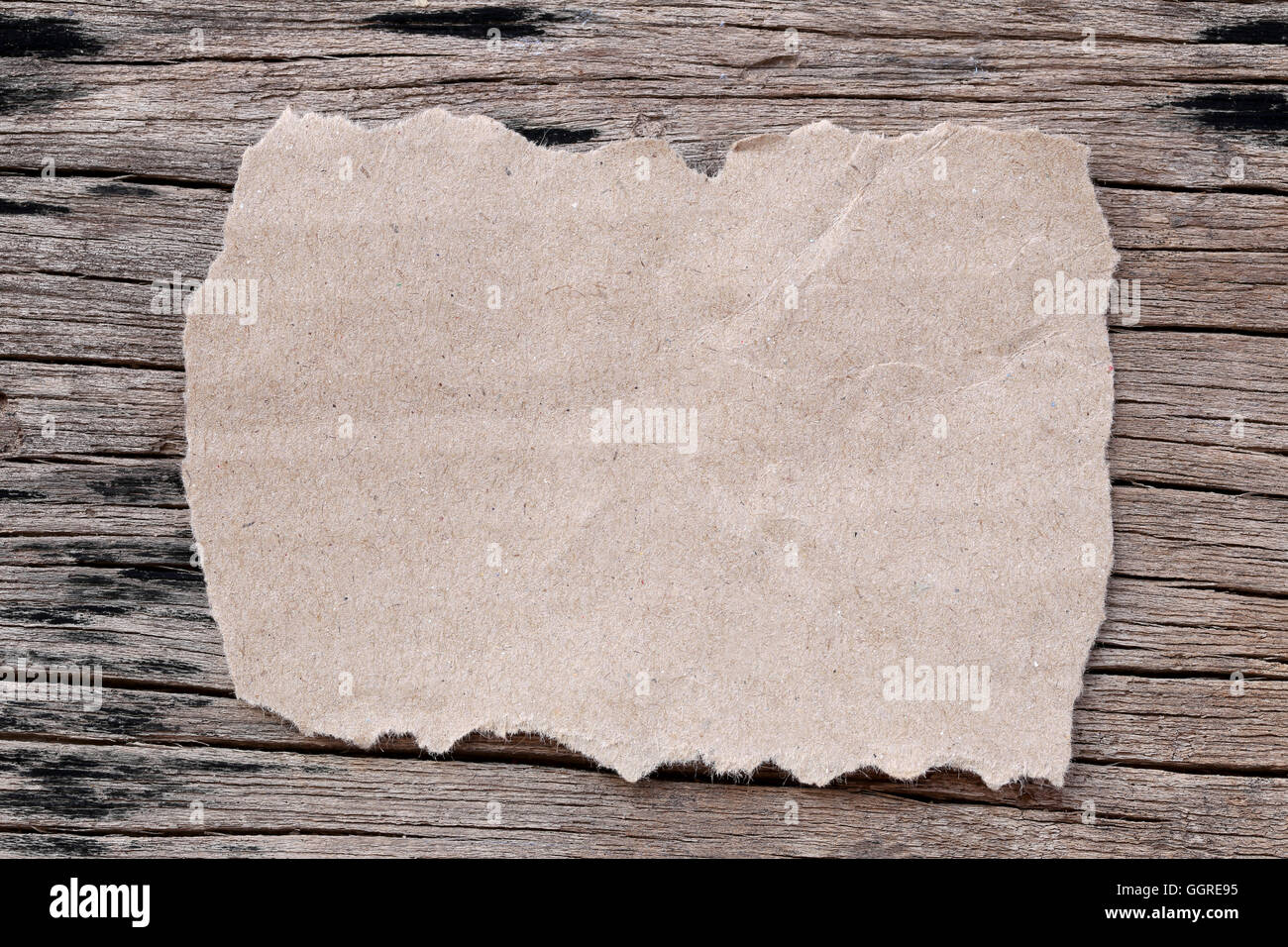 old brown paper of rectangle on wood background and copy space to input text. Stock Photo