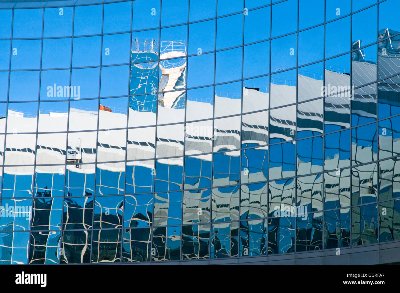 Reflections on glass facade. Background. Stock Photo