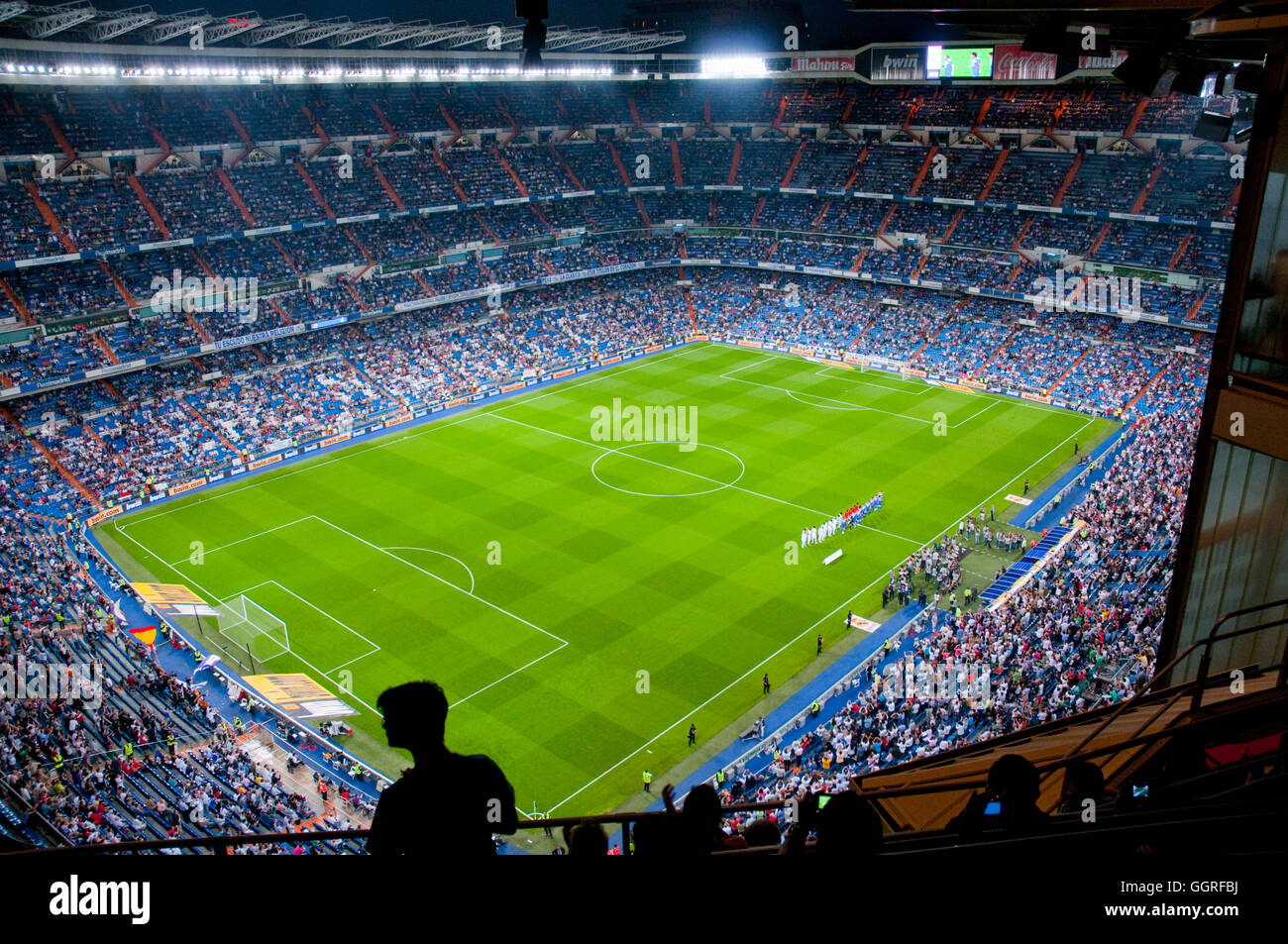 Football teams lined up before the match. Santiago Bernabeu stadium, Madrid, Spain. Stock Photo