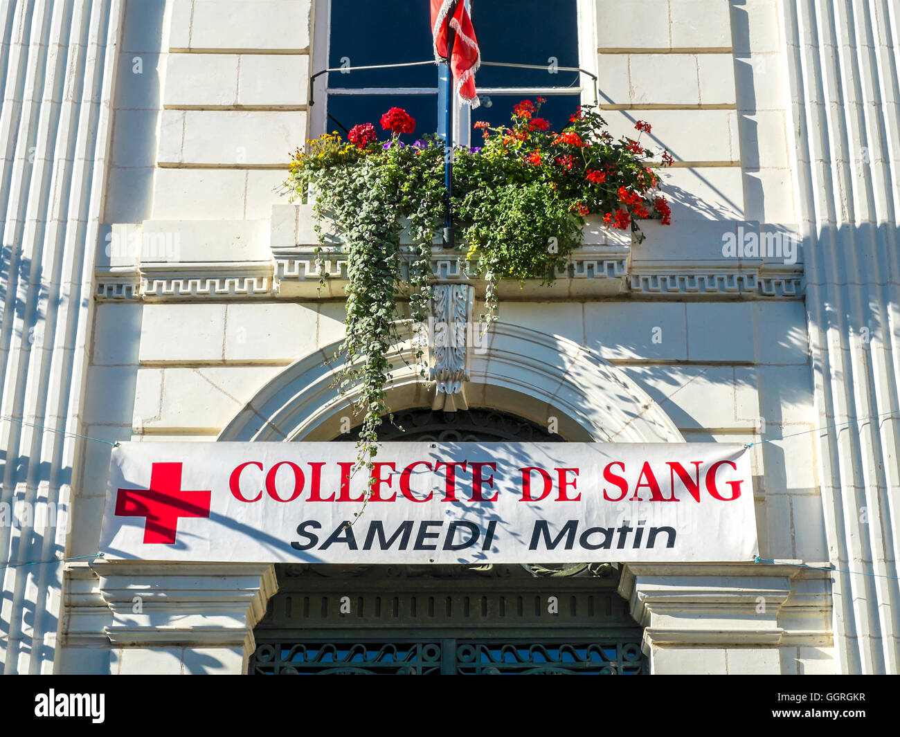 “Blood Collection” / “Collect de Sang” banner on town hall - France. Stock Photo