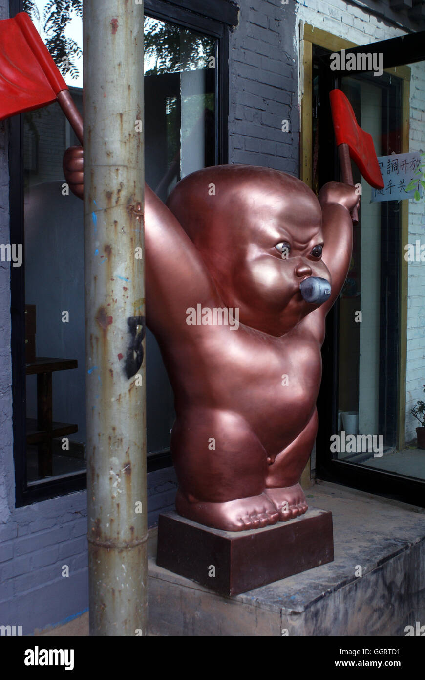 Angry crying baby statue in the 798 Art District, a trendy neighborhood