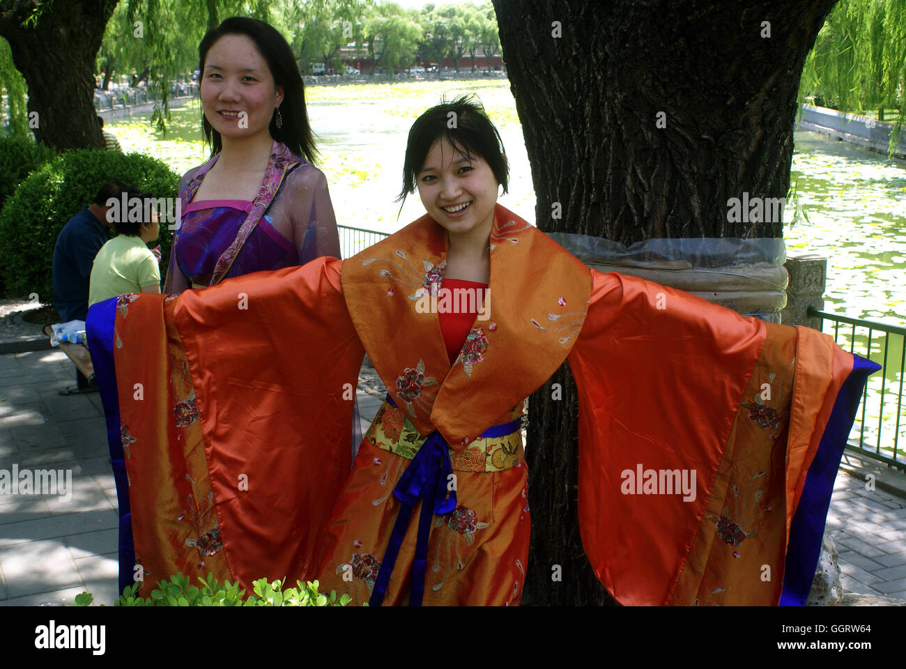 Girls performing an impromptu opera scene in Beihai Park. Beijing ...