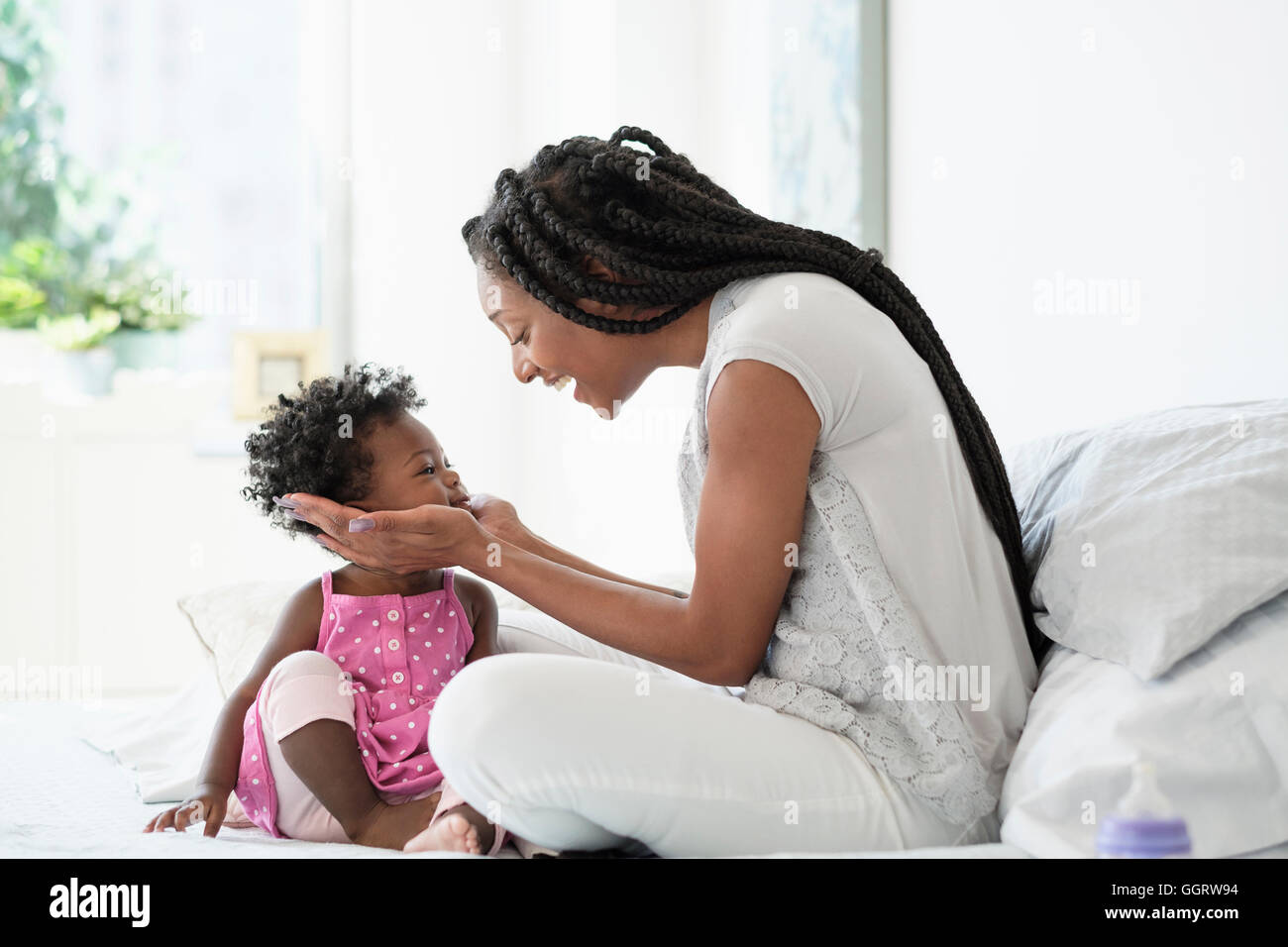 Cupping face of baby hires stock photography and images Alamy