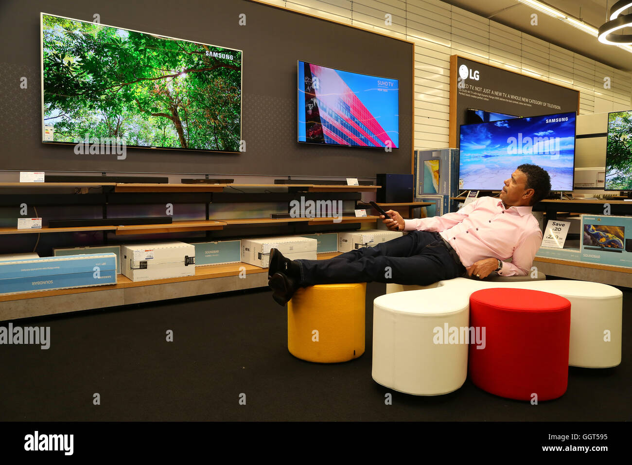 EDITORIAL USE ONLY TV pundit Chris Kamara opens the 4K TV department at the brand new Currys PC