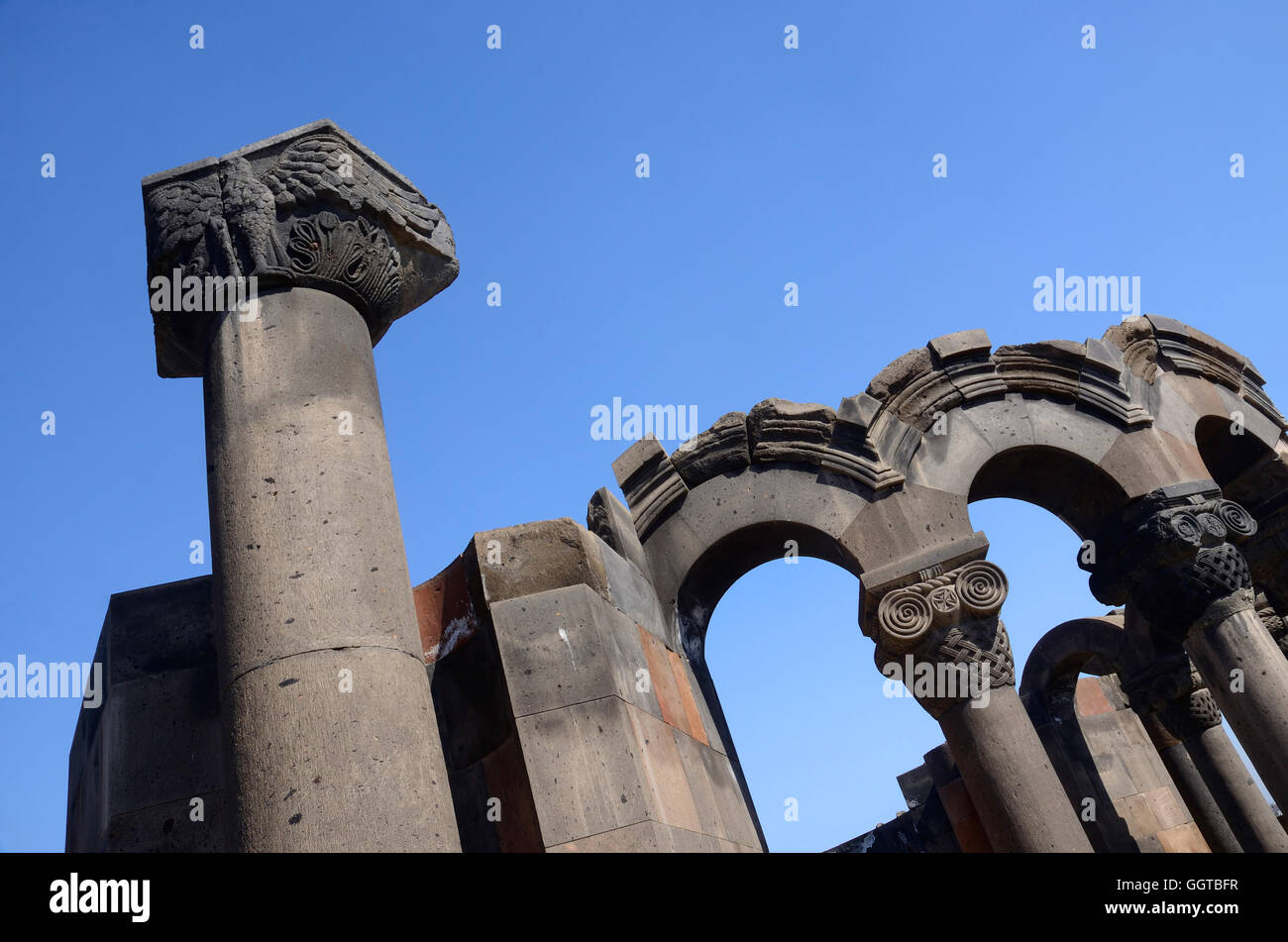 Column with eagle figure at Zvartnots (celestial angels) temple ruins near Echmiadzin ,Armenia,Central Asia,unesco heritage site Stock Photo
