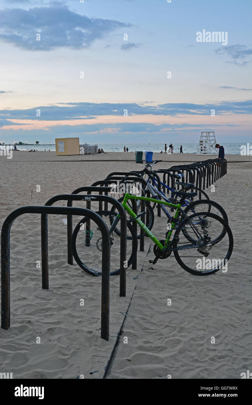 The bike racks at Oak Street Beach clear out at sunset in Chicago, Illinois. Stock Photo