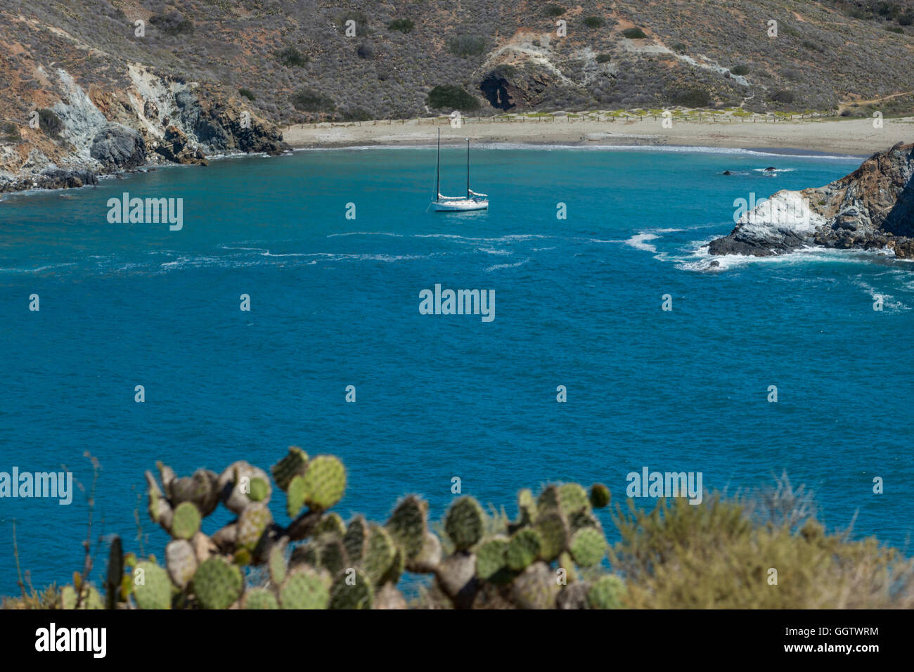 Boat in ocean cove Stock Photo