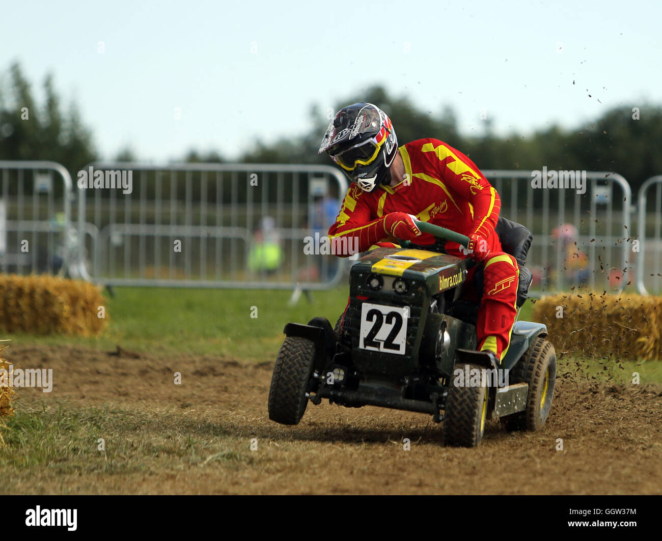 A member of the Smack the Pony team tries to qualify ahead of the 12 hour lawn mower race - which commences at 8pm - at Five Oaks, West Sussex. Stock Photo