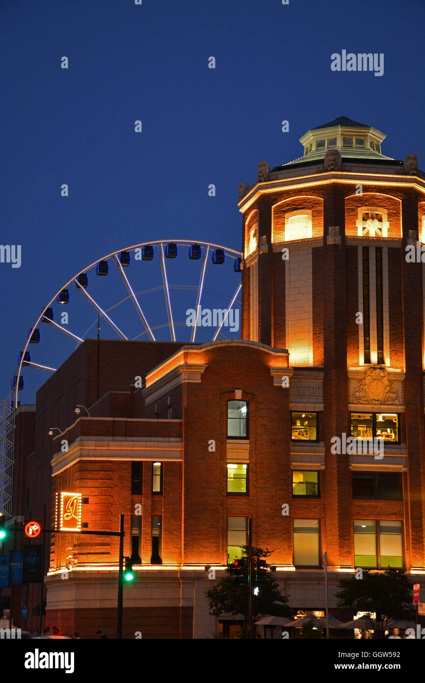 The front towers of Navy Pier  with the ferris wheel in the background are illuminated at night. Stock Photo