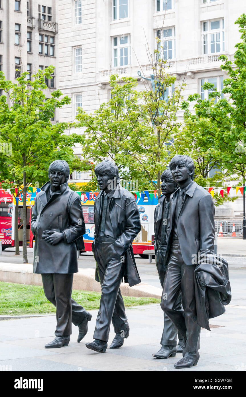 The statue of The Beatles on Liverpool's waterfront was unveiled by John Lennon's sister, Julia Baird, in December 2015. Stock Photo