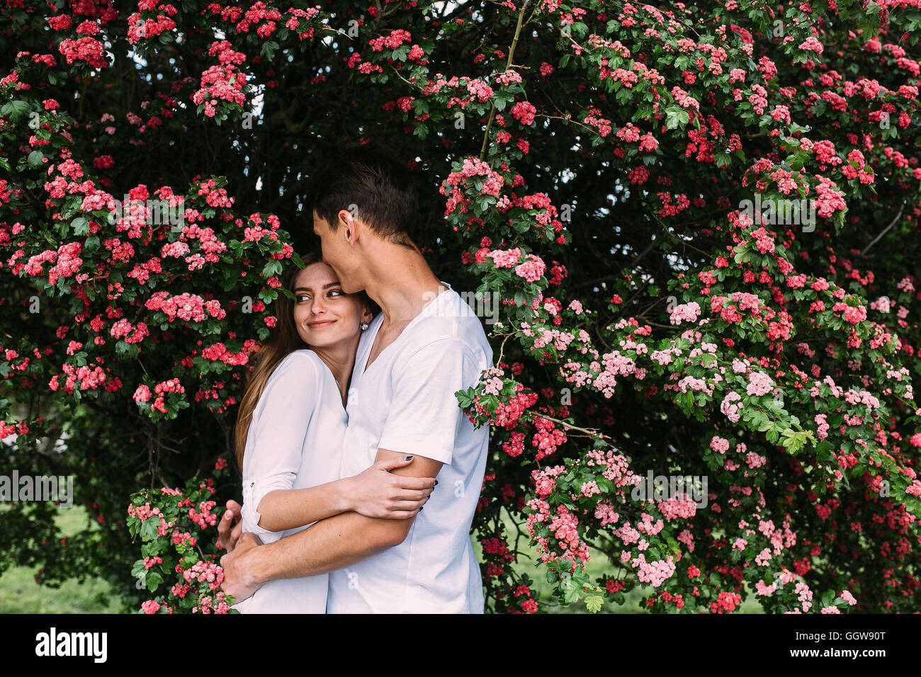 Young happy couple in love outdoors Stock Photo - Alamy