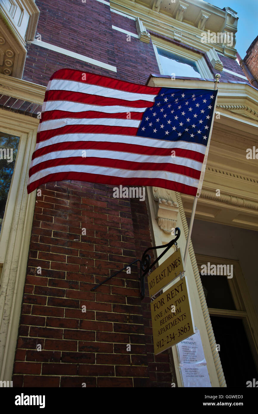 American Flag on a southern style mansion in the historical section of SAVANNA GEORGIA Stock Photo