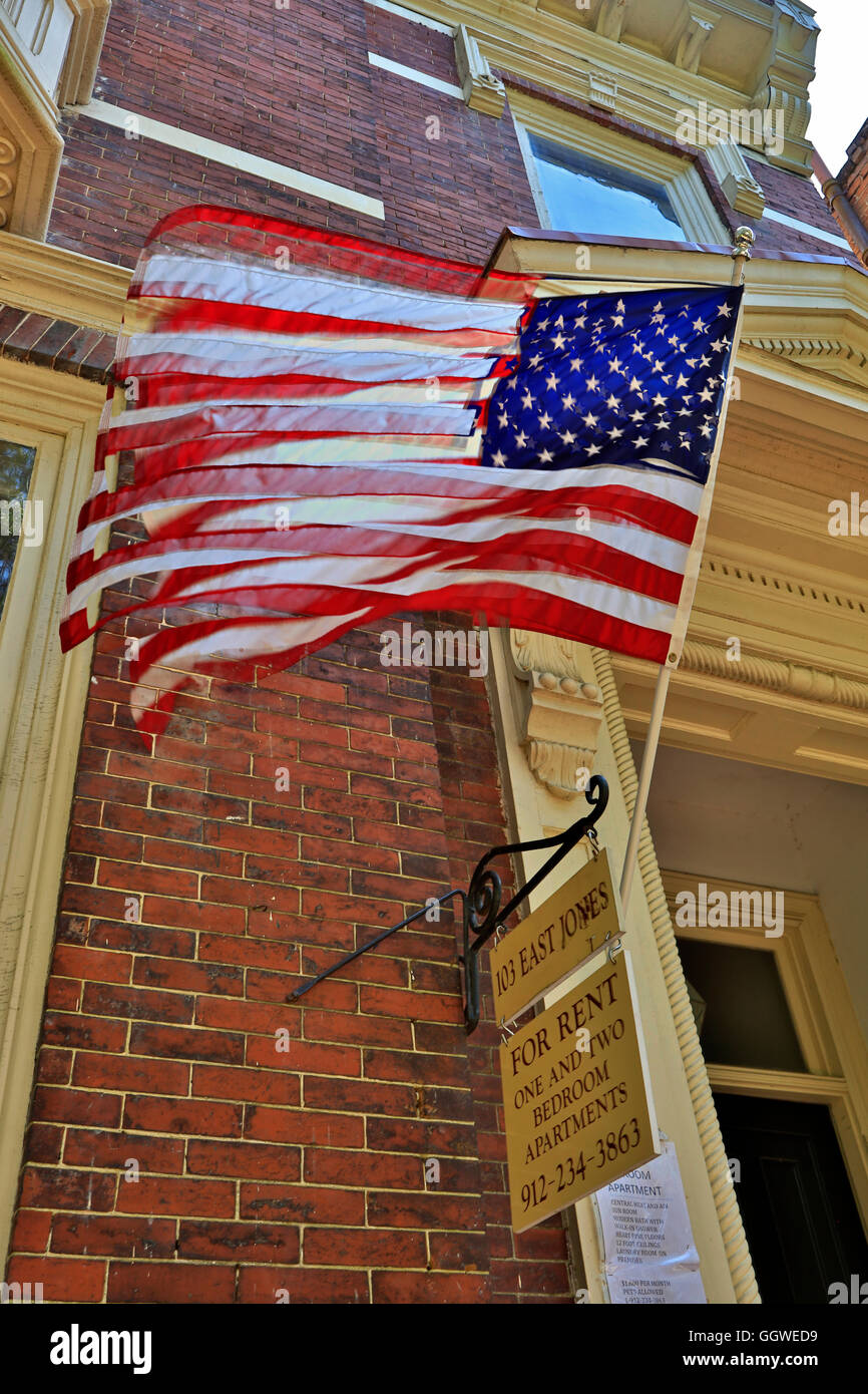 American Flag on a southern style mansion in the historical section of SAVANNA GEORGIA Stock Photo