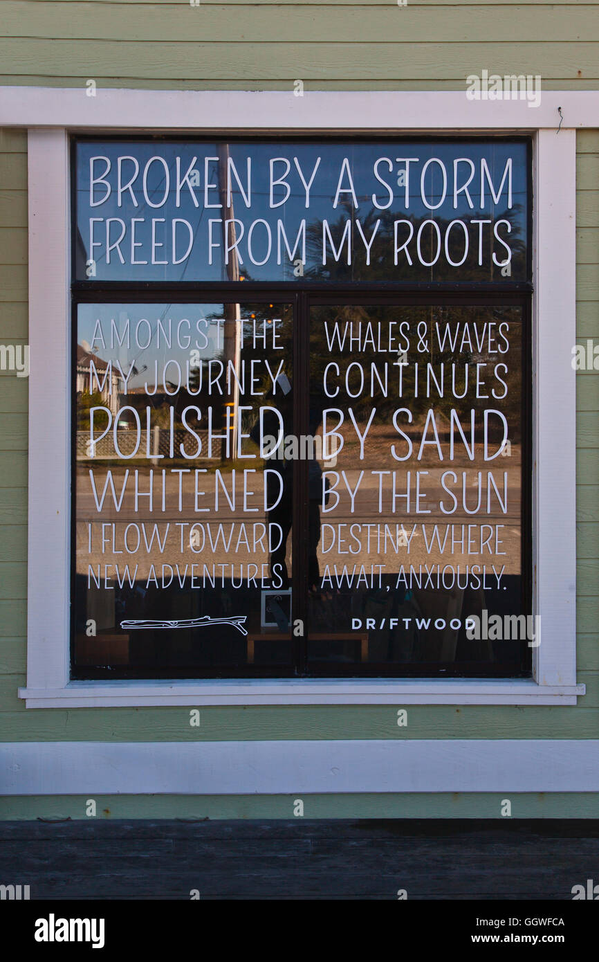 ANTIQUE STORE WINDOW with poetry -  MOSS LANDING, CALIFORNIA Stock Photo