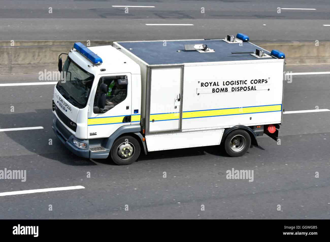 Aerial view British Army Royal Logistic Corps Bomb Disposal lorry truck on Uk motorway England Stock Photo