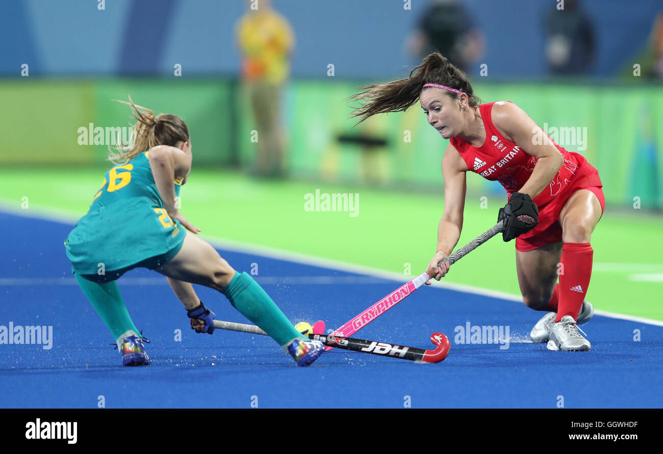 Great Britain's Laura Unsworth (right) takes on Australia's Emily Smith in the Women's Pool B hockey match at the Olympic Hockey Centre on the first day of the Rio Olympics Games, Brazil. Stock Photo