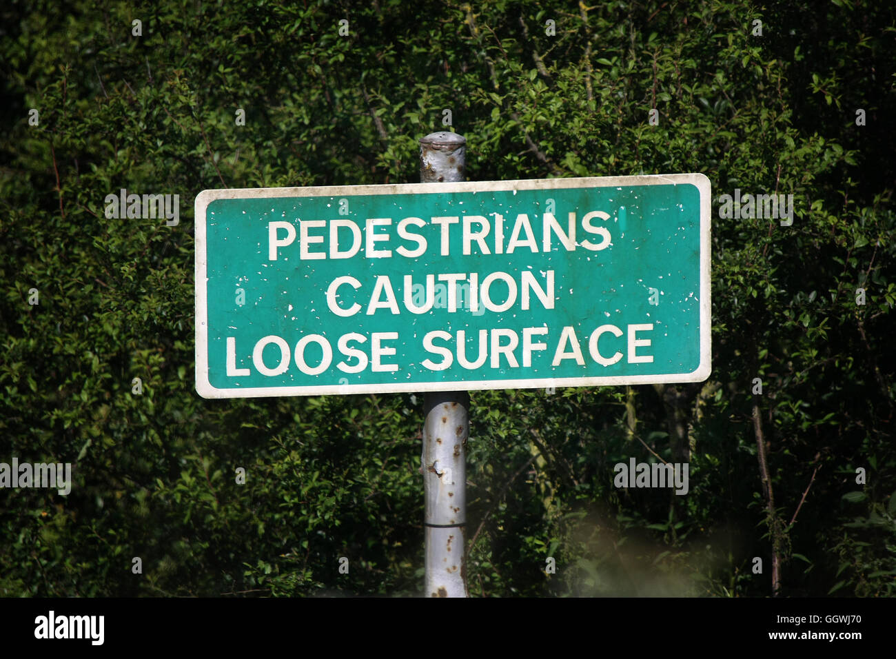 pedestrian-warning-sign-for-loose-surface-on-walking-track-stock-photo-alamy