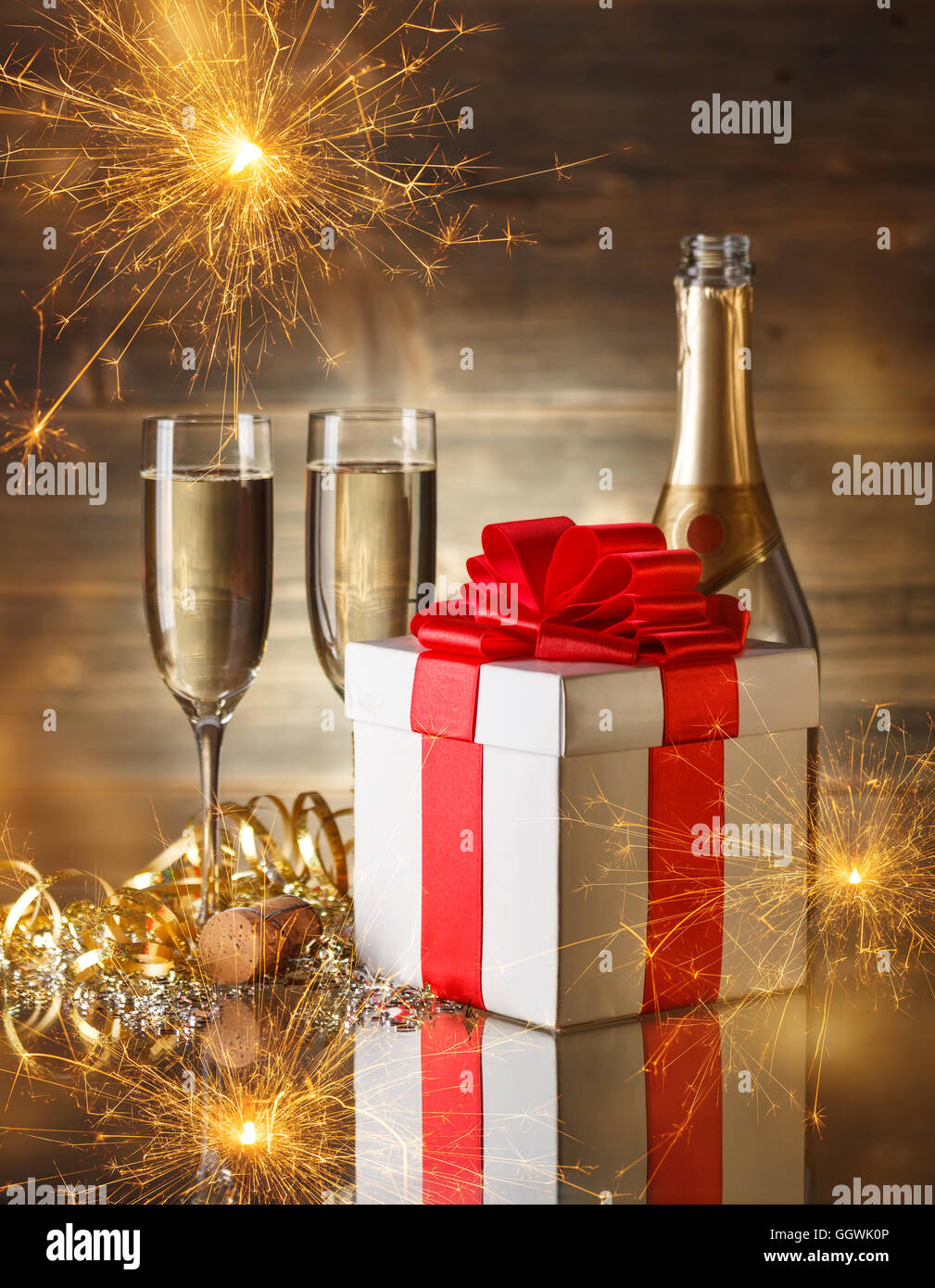 Glasses of champagne with gift box Stock Photo