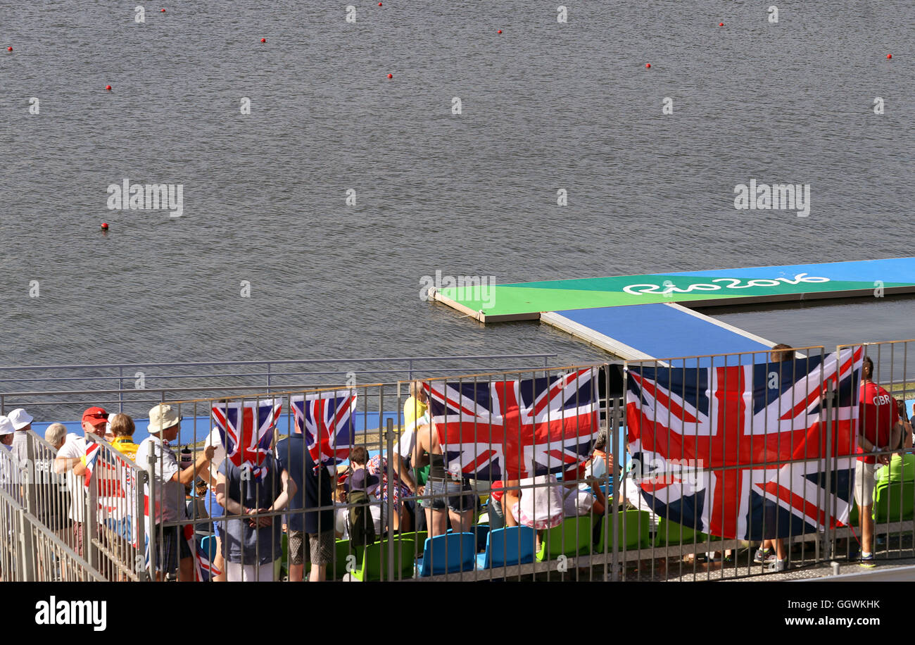 A Union Jack flag blows in the wind at the Lagoa Stadium on the second day of the Rio Olympics Games, Brazil. The second day of rowing at Rio 2016 has been delayed due to the wind whipping across the Lagoa. Stock Photo