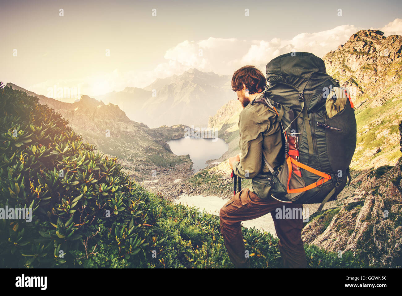 Man Traveler with big backpack mountaineering Travel Lifestyle
