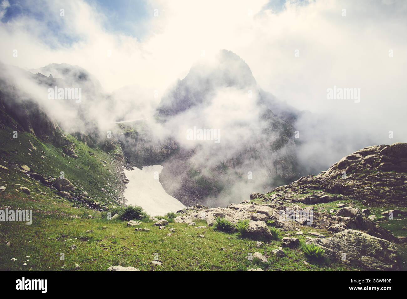 Rocky Mountains foggy Landscape with clouds and green valley Summer ...